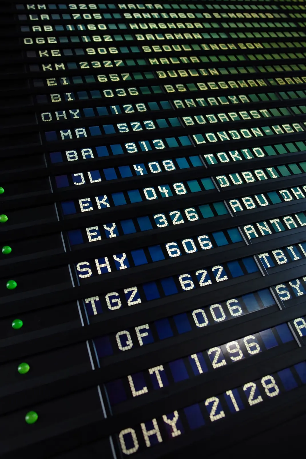 Airport departures board listing international flights